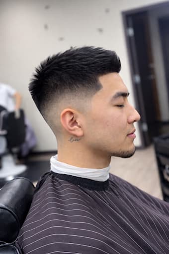 Textured crop over a mid skin fade